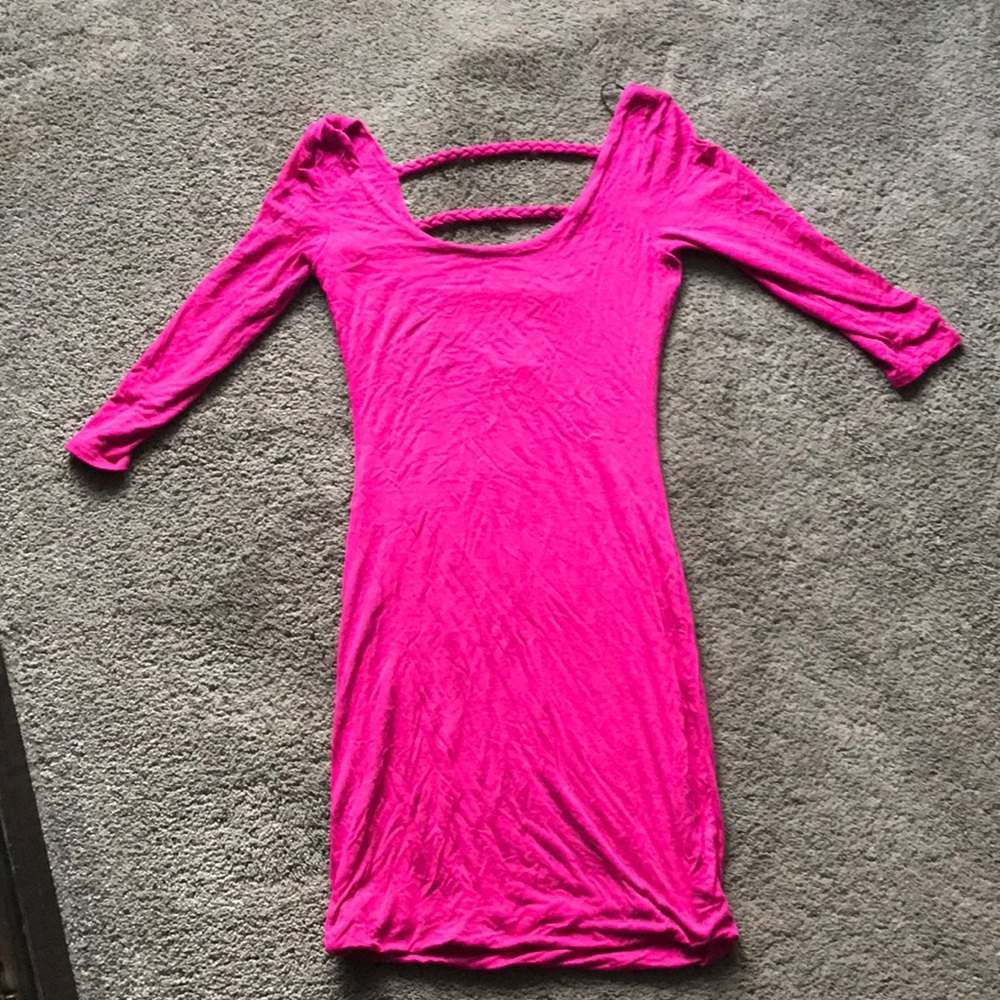 Hot pink body con dress with braided back.